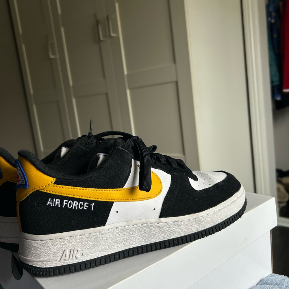 Air Force 1 low 07’ LV8
Athletic Club Black University Gold